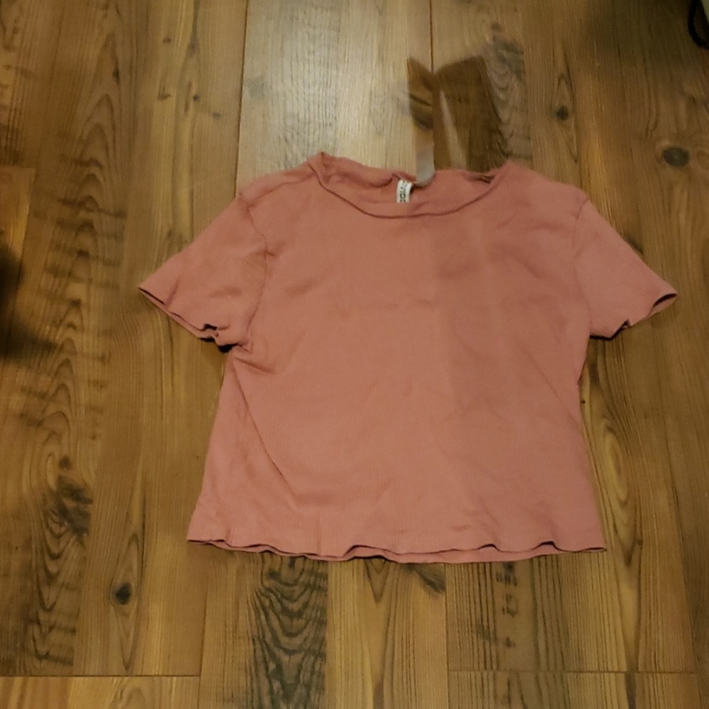 Pinkish kinda like a crop top